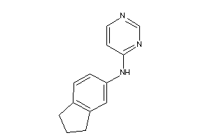 Indan-5-yl(4-pyrimidyl)amine