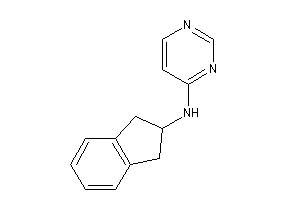 Indan-2-yl(4-pyrimidyl)amine